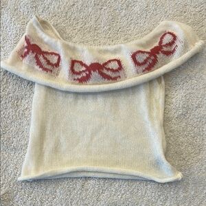 Cream Knit Off-Shoulder Top with Red Bow Design